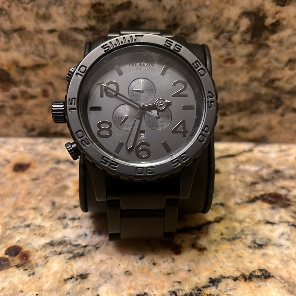 Nixon watch for sale it’s in mint condition, and Harley worn.